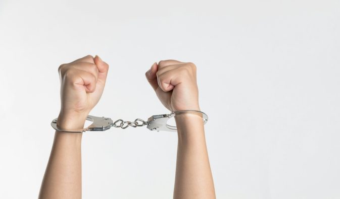 person showing handcuff